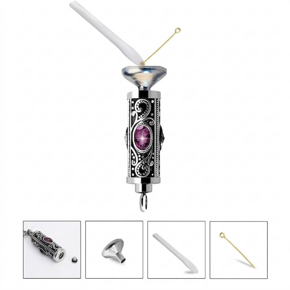 Cremation jewelry filling kit included with mini funnel, pin tool, and spoon for placing ashes into the stainless steel cylinder pendant.