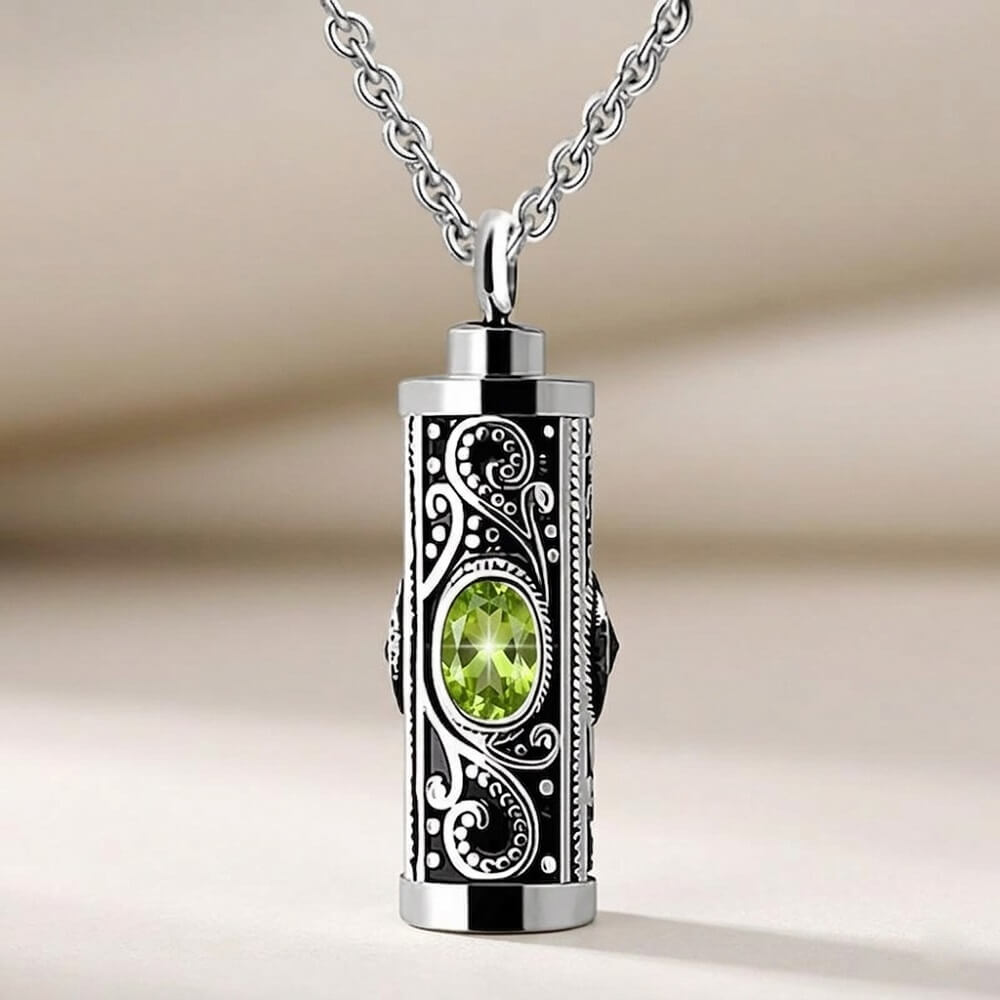 August birthstone peridot olive green gemstone cylinder cremation jewelry for ashes, vintage engraved keepsake urn pendant.