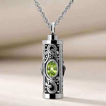 August birthstone peridot olive green gemstone cylinder cremation jewelry for ashes, vintage engraved keepsake urn pendant.