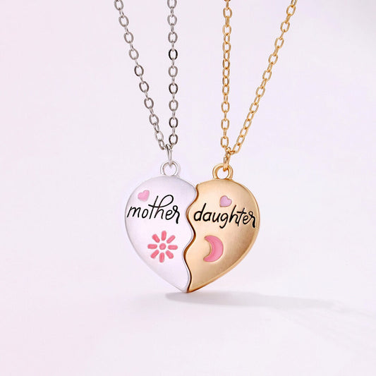Magnetic mother-daughter puzzle heart necklace set clicking together