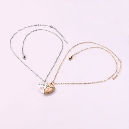 Set of 2 magnetic mother-daughter necklaces on a display card